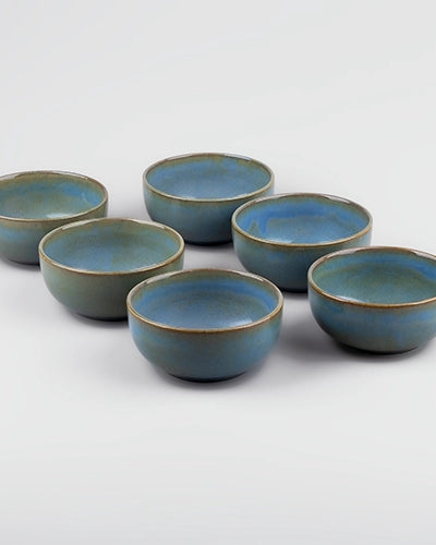 Set of six mint green porcelain bowls
