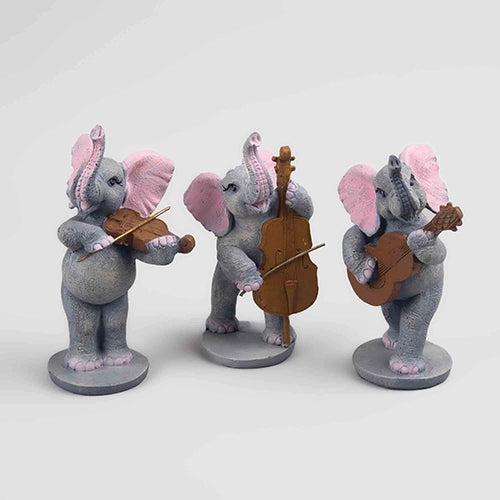 Decorative elephant trio with instruments for elegant home styling