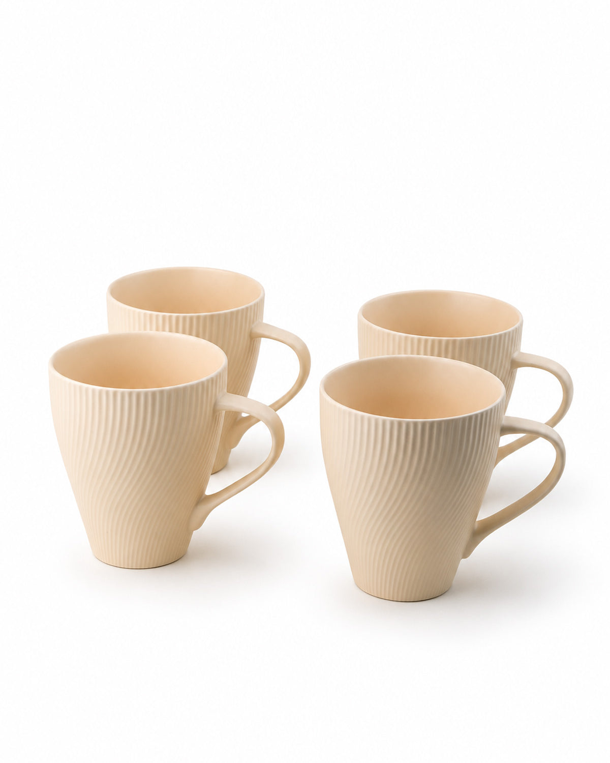 Set of four pale peach New Bone China coffee mugs
