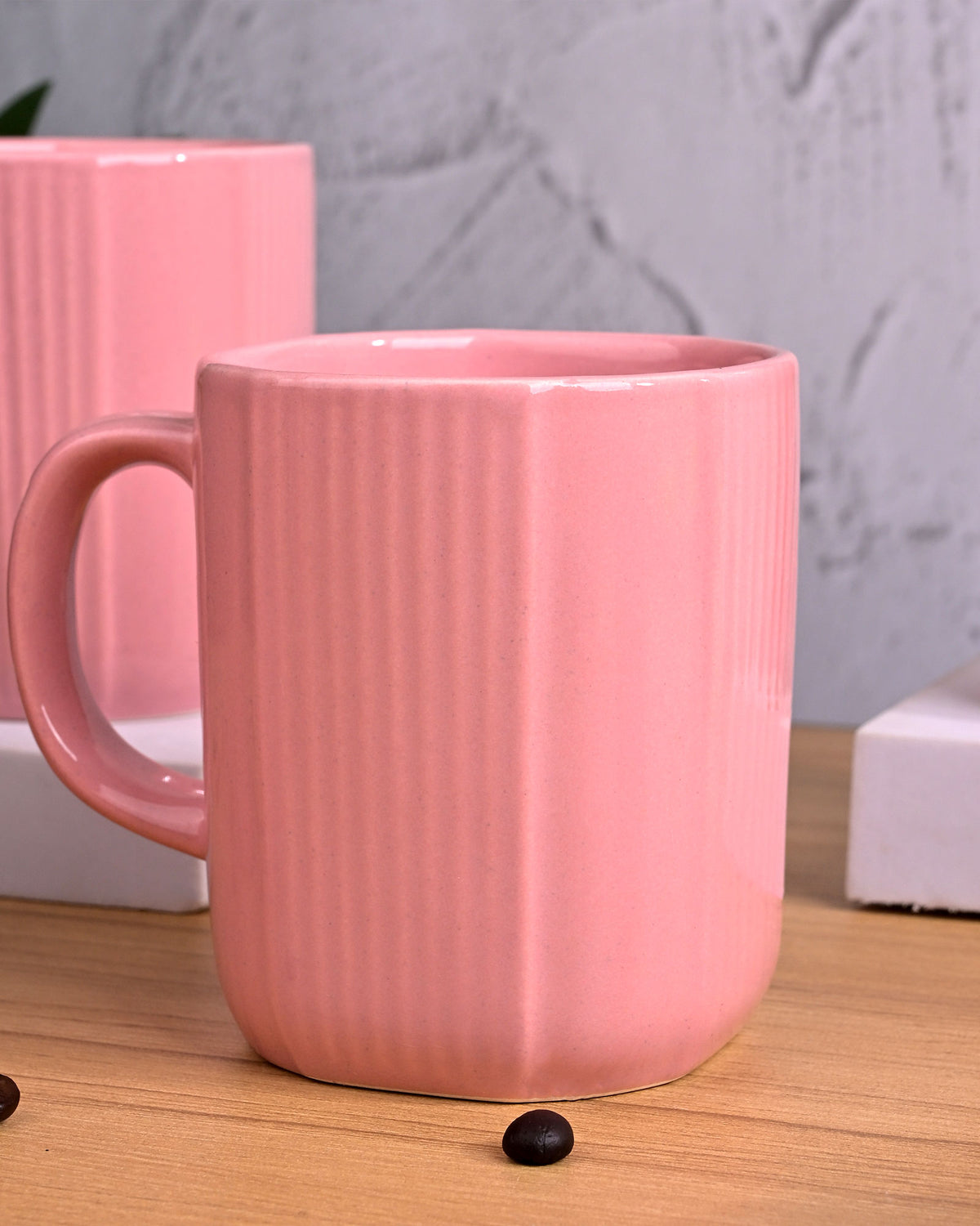 Stylish pastel pink coffee mugs