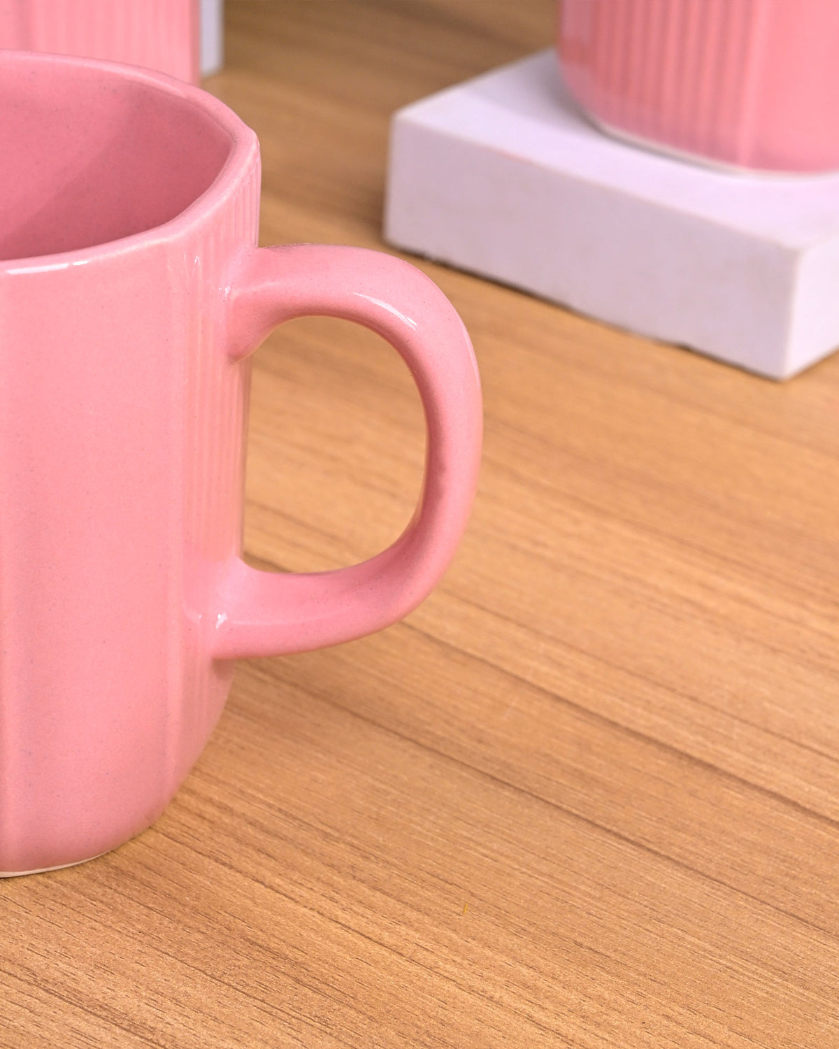 Pastel pink ceramic mugs for coffee