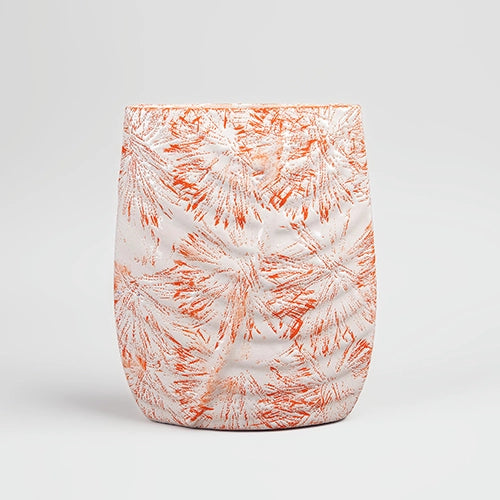 Decorative peach vase featuring a detailed leaf imprint
