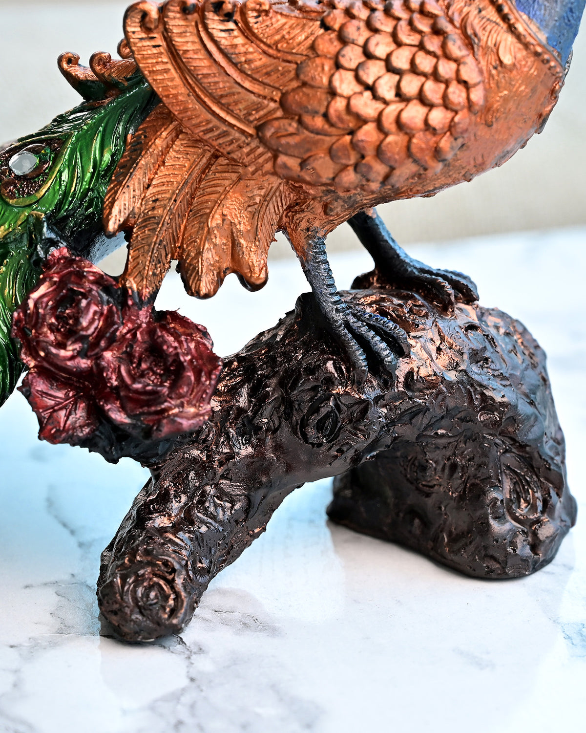 Handcrafted peacock and tree trunk decorative statue