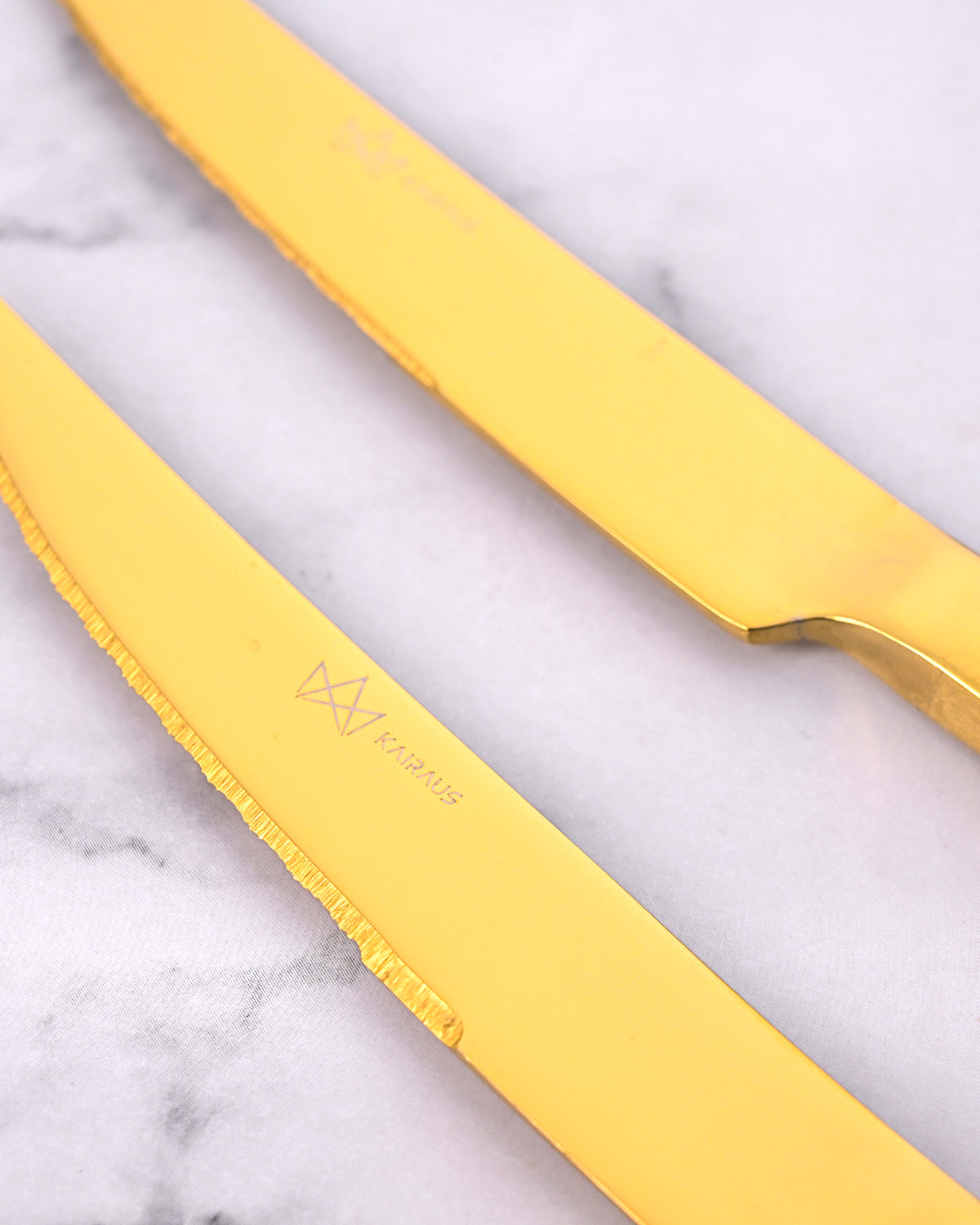Elegant Gold Stainless Steel Knives with a Sleek and Polished Design