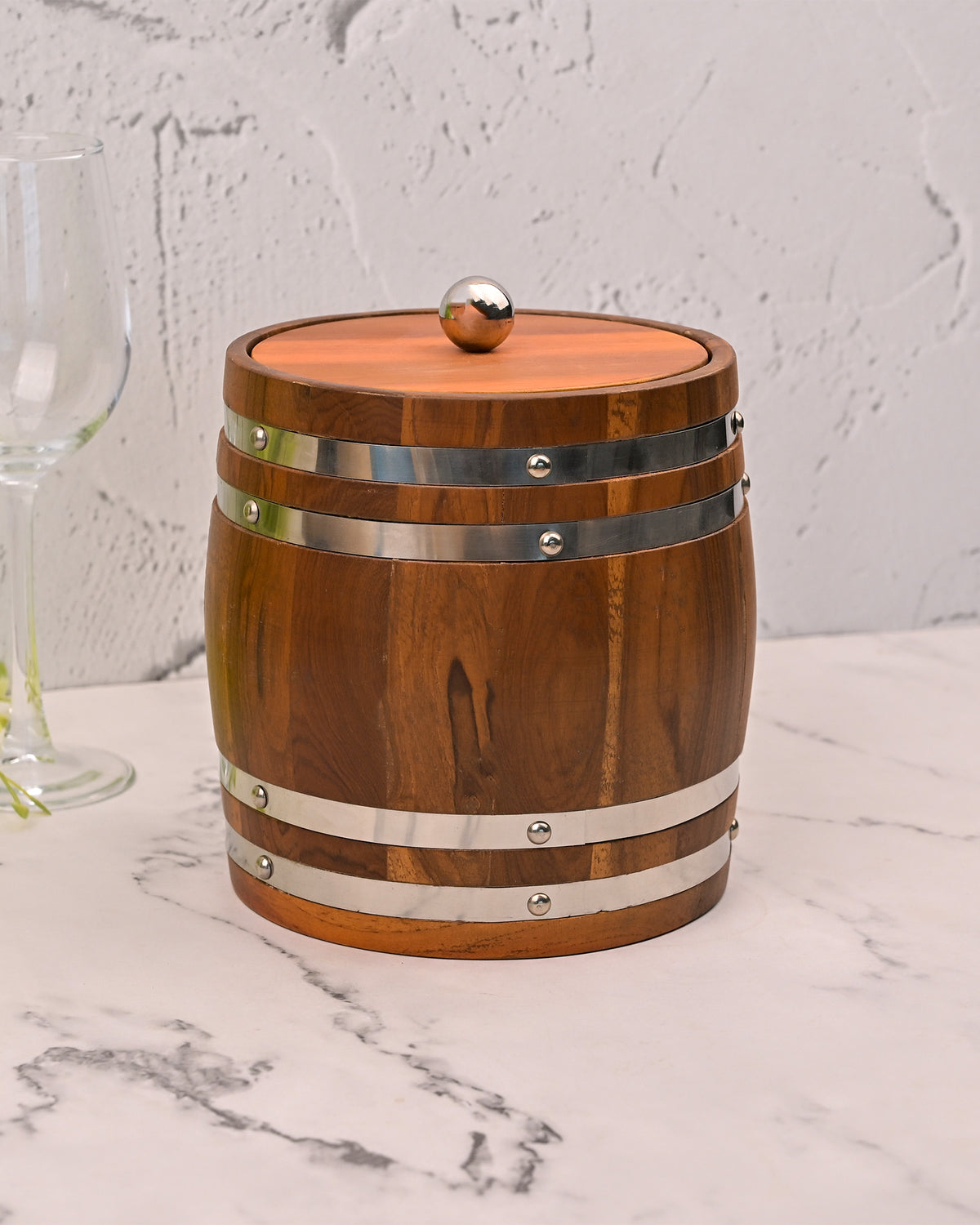 Rustic Wooden Ice Bucket Displayed on a Contemporary Serving Counter