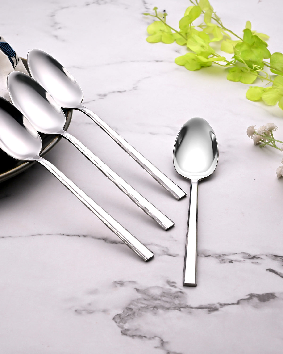 Close-Up View of Sleekline Stainless Steel Spoons with a Shiny Finish