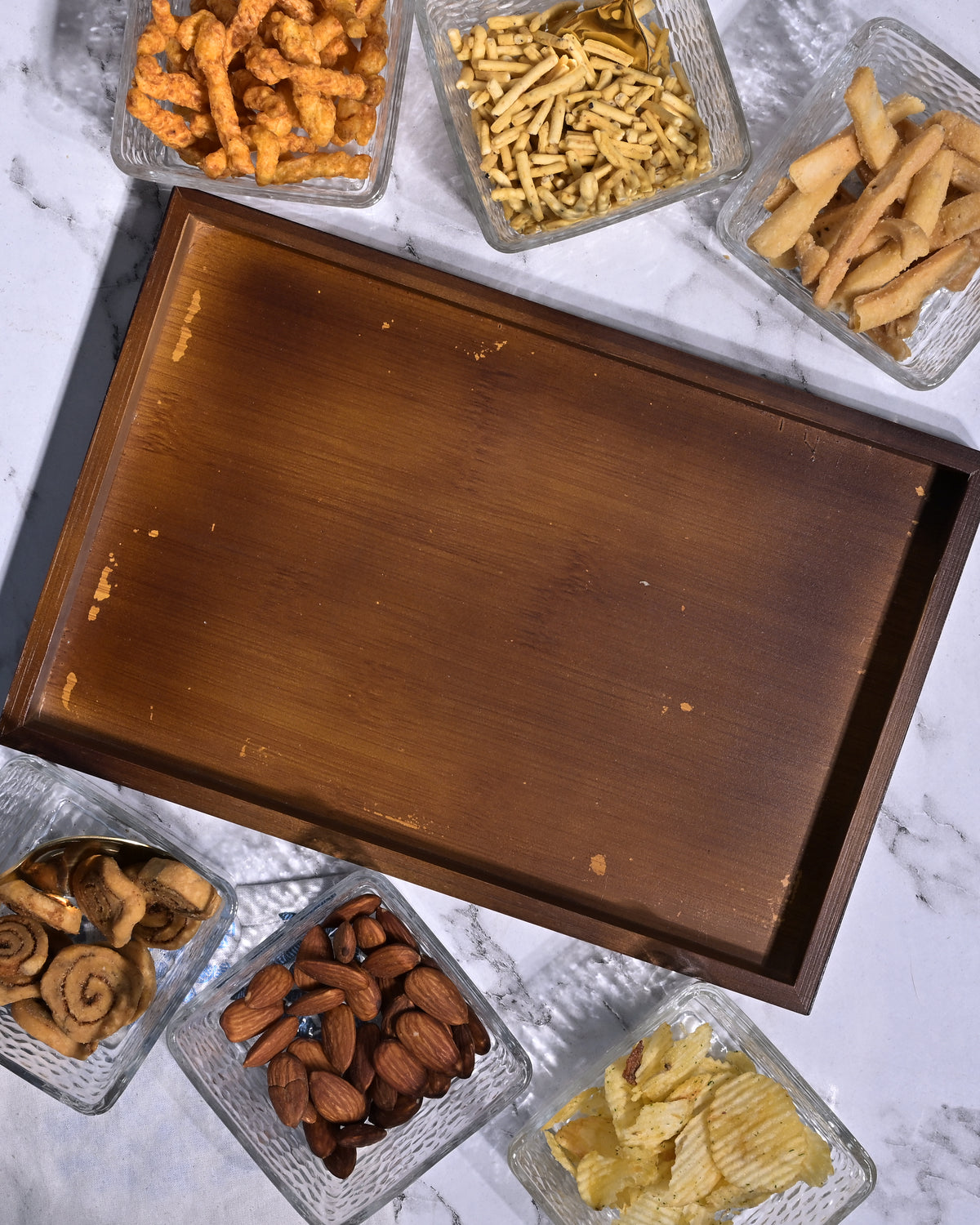 Decorative glass serving bowl on tray