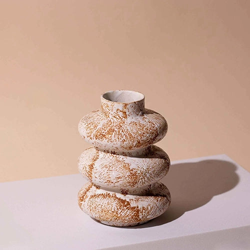 Artistic ceramic vase with a distinctive three-ring design
