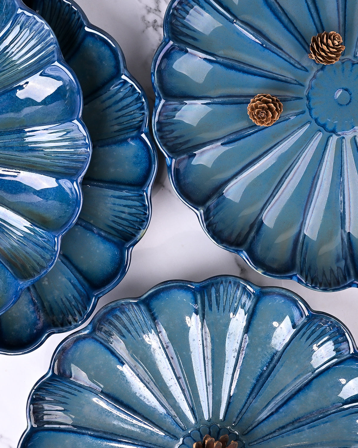 Set of 4 teal blue flower shaped ceramic plates