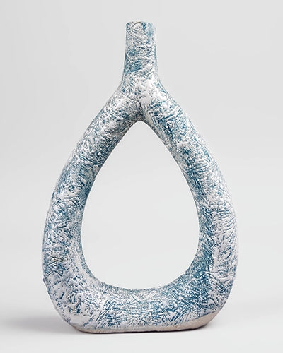 Elegant teal triangle vase featuring a textured finish