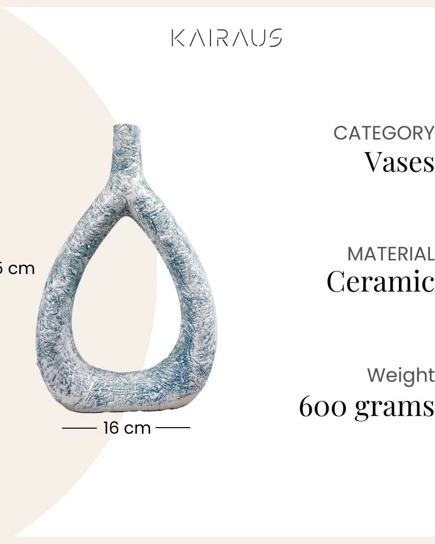 Decorative teal vase with a unique triangular shape