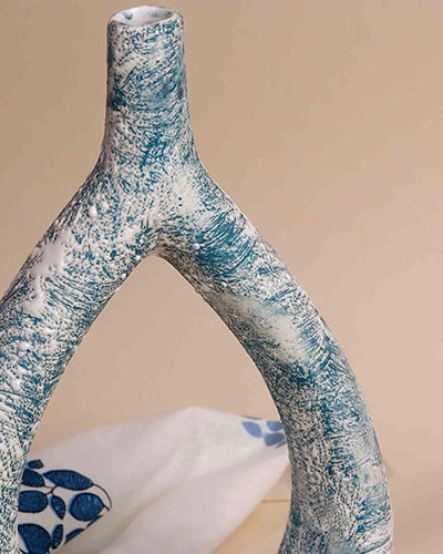 Sculptural triangle vase in a rich teal finish