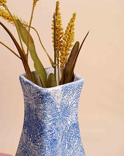Stylish textured vase in a rich blue finish