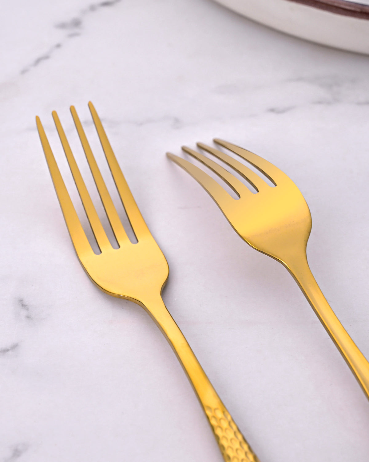 Timeless Gold Forks with a Sleek and Polished Design