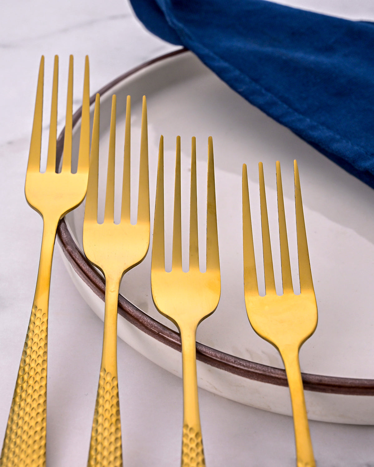 Timeless Gold Forks with a Sleek and Polished Design