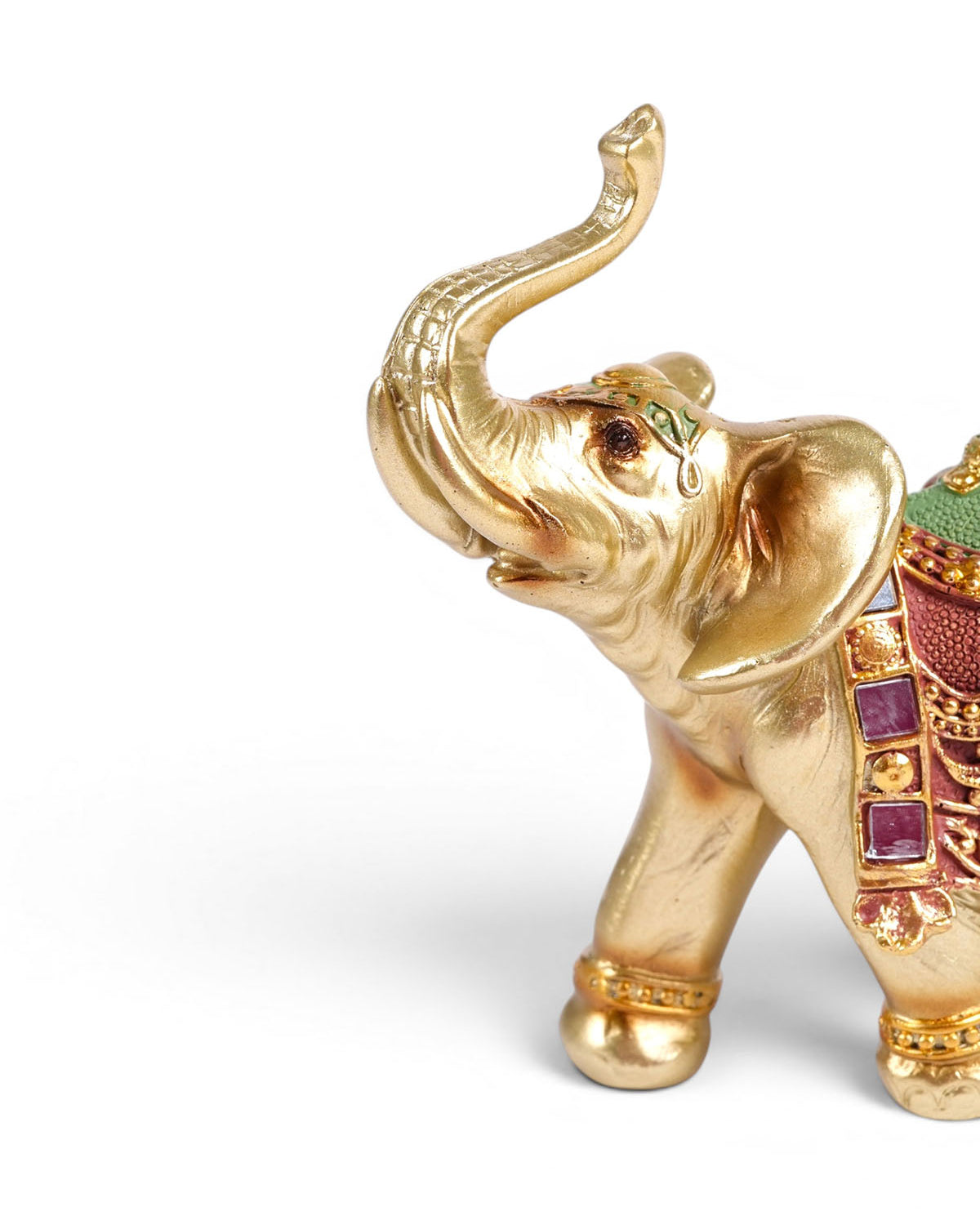 Golden elephant figurine Vaibhav displayed on a tabletop