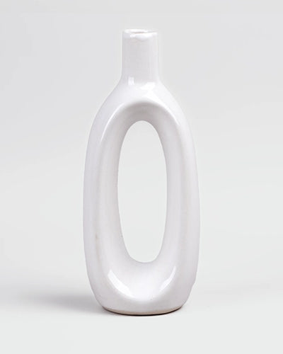 Minimalist white glossy vase featuring a unique hollow shape