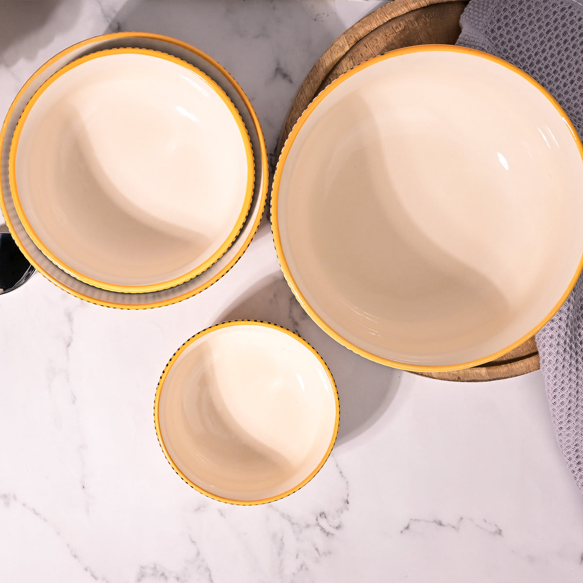 Yellow ceramic-style printed serving bowls