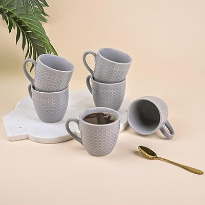 Elegant Sculpted Grey Ceramic Tea Cup