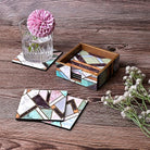 Decorative wooden coasters with abstract artwork

