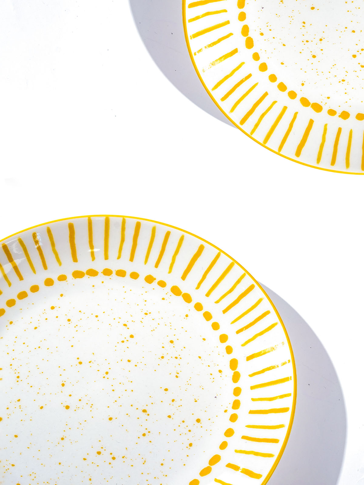 Amoret quarter plates arranged for a modern dining table setting


