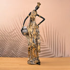 Antique African tribal woman statue with traditional detailing

