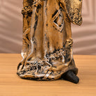 Traditional African woman statue with intricate craftsmanship

