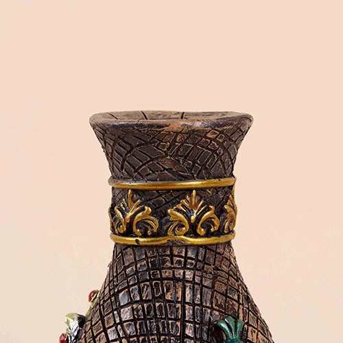 Vintage vase adorned with beautiful peacock detailing

