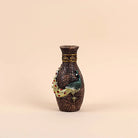 Classic antique vase showcasing an elegant peacock motif

