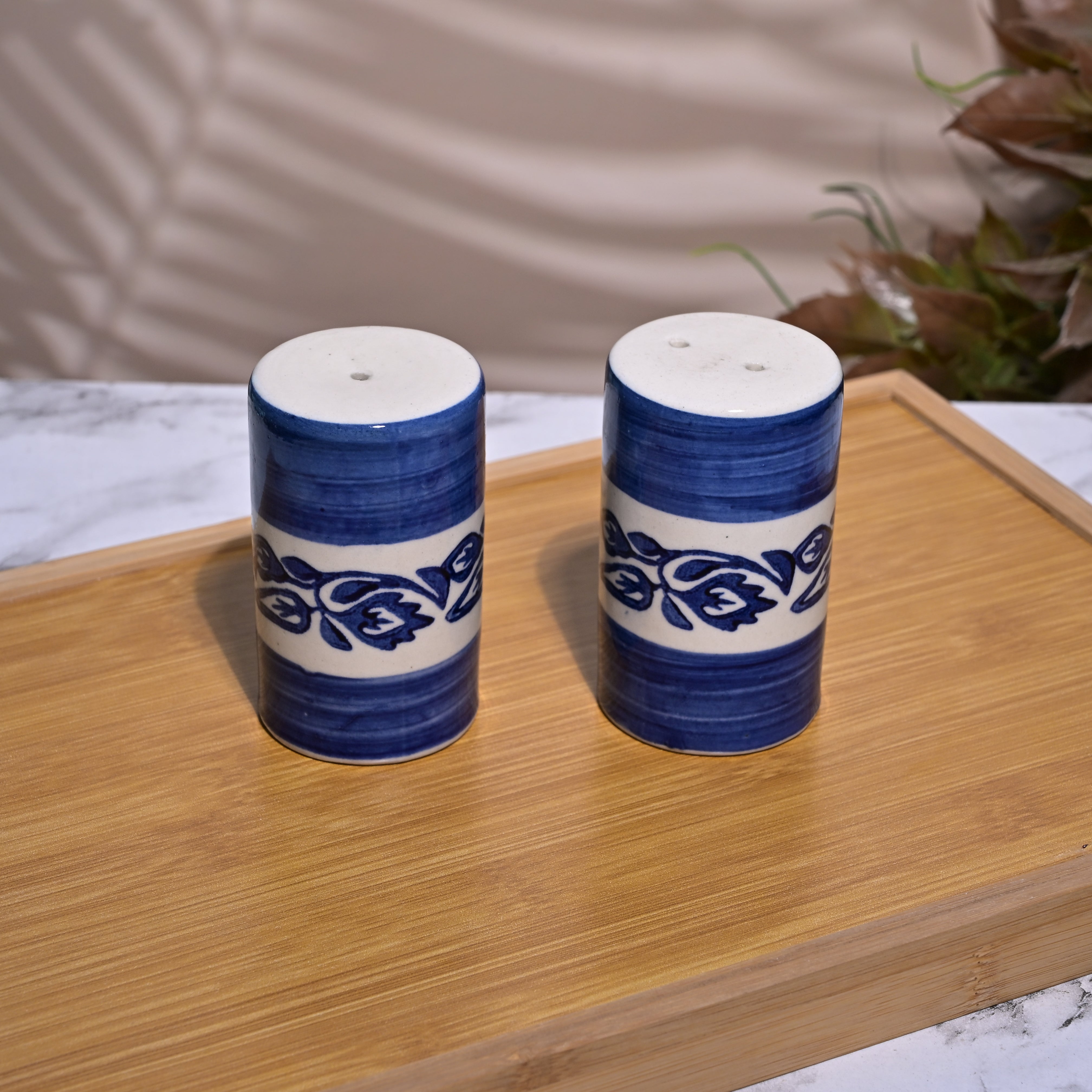 Artistic blue Italian ceramic salt and pepper shakers
