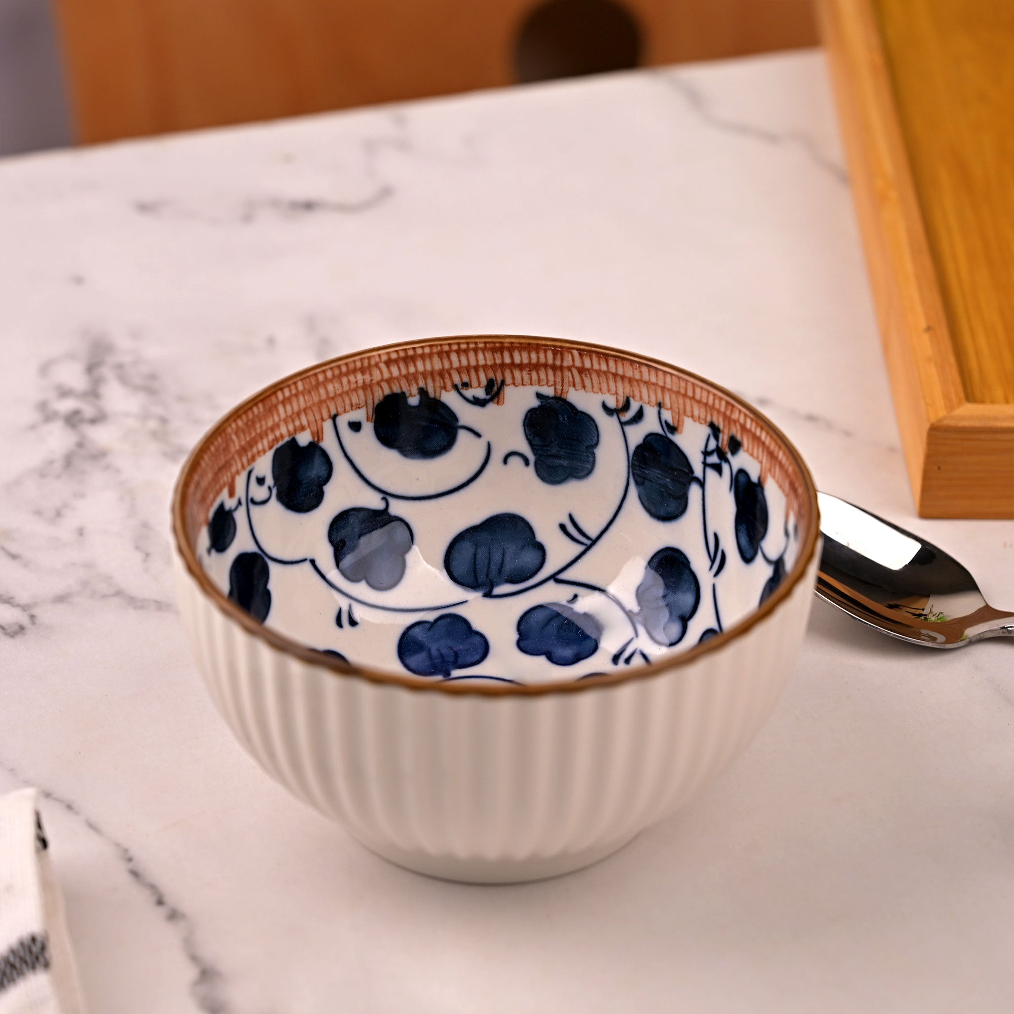Stylish set of four porcelain bowls for home dining

