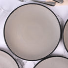 Black-rimmed grey serving plates set of 4

