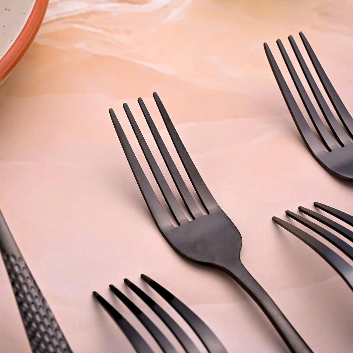 Elegant Black Steel Forks for Stylish Dining Table Settings

