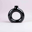 Elegant black ring vase for contemporary home decor

