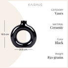 Decorative black donut ring vase for stylish interiors

