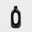 Elegant black hollow vase for modern home decor

