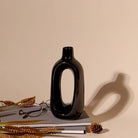 Artistic minimalist vase with a deep black finish


