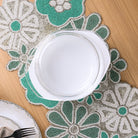 Premium handcrafted beaded table mat with floral design
