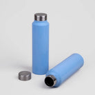 Blue Stainless Steel Water Bottle photographed in natural lighting

