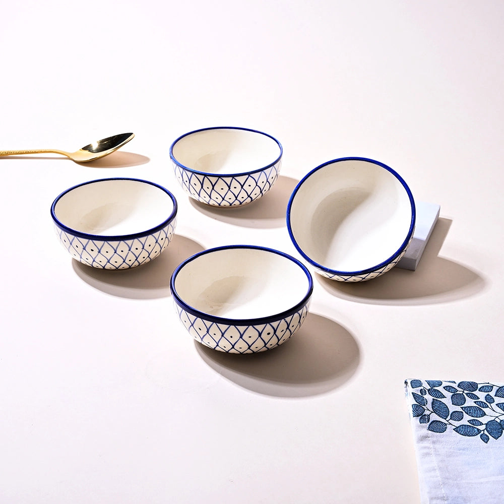 Stylish blue ceramic serving bowls with glossy finish

