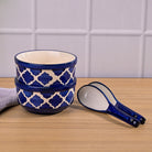 Decorative blue soup bowls with coordinating spoons

