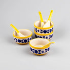 Four-piece blue soup bowls with coordinating spoons

