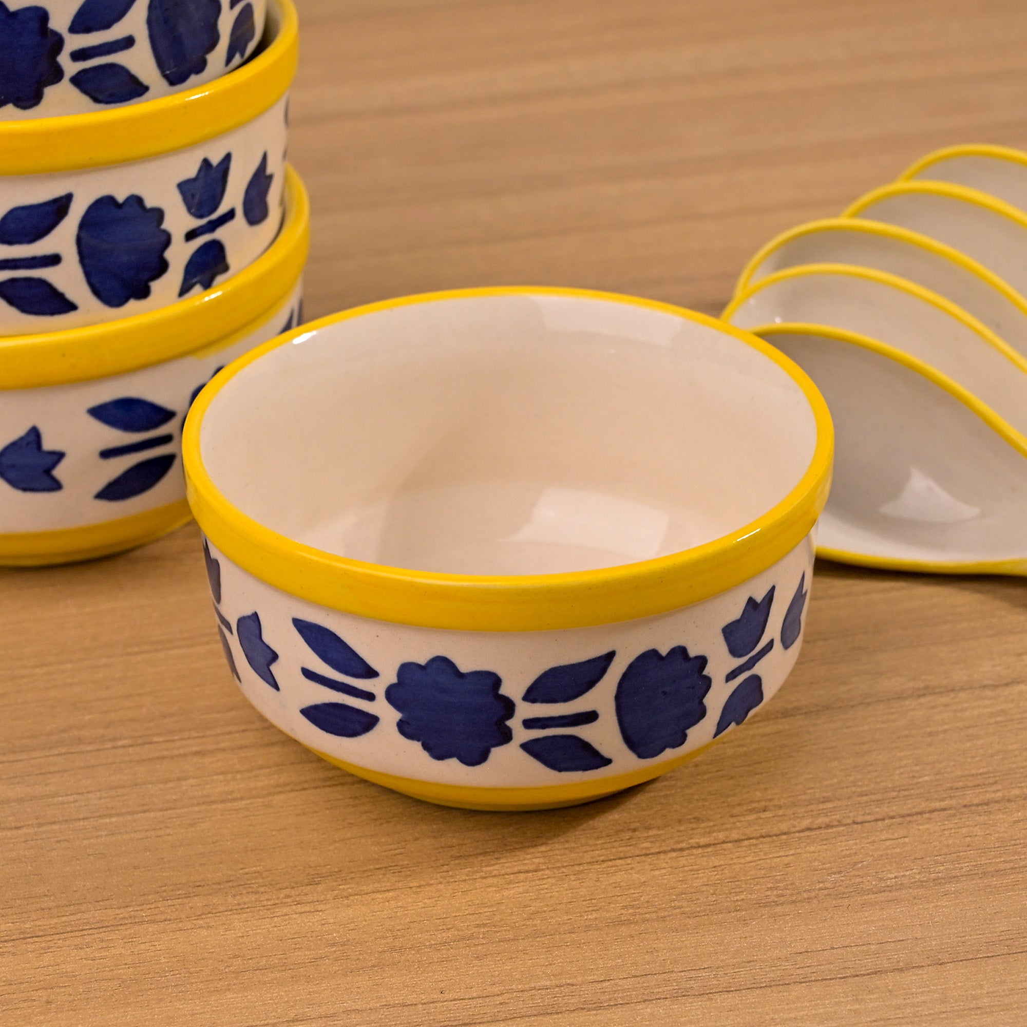 Elegant blue soup serving bowls with matching spoons

