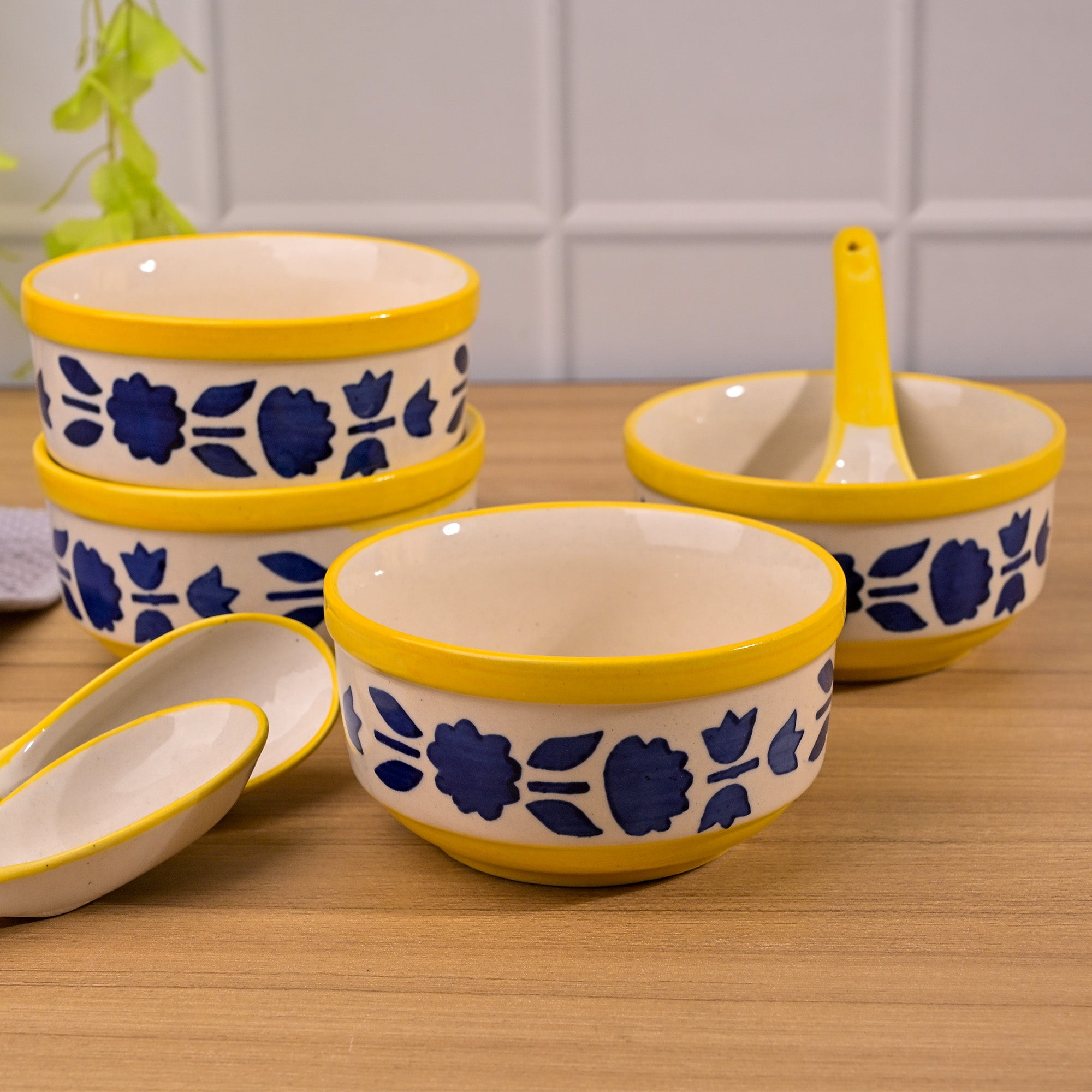 Blue porcelain bowls and spoons for dining and serving

