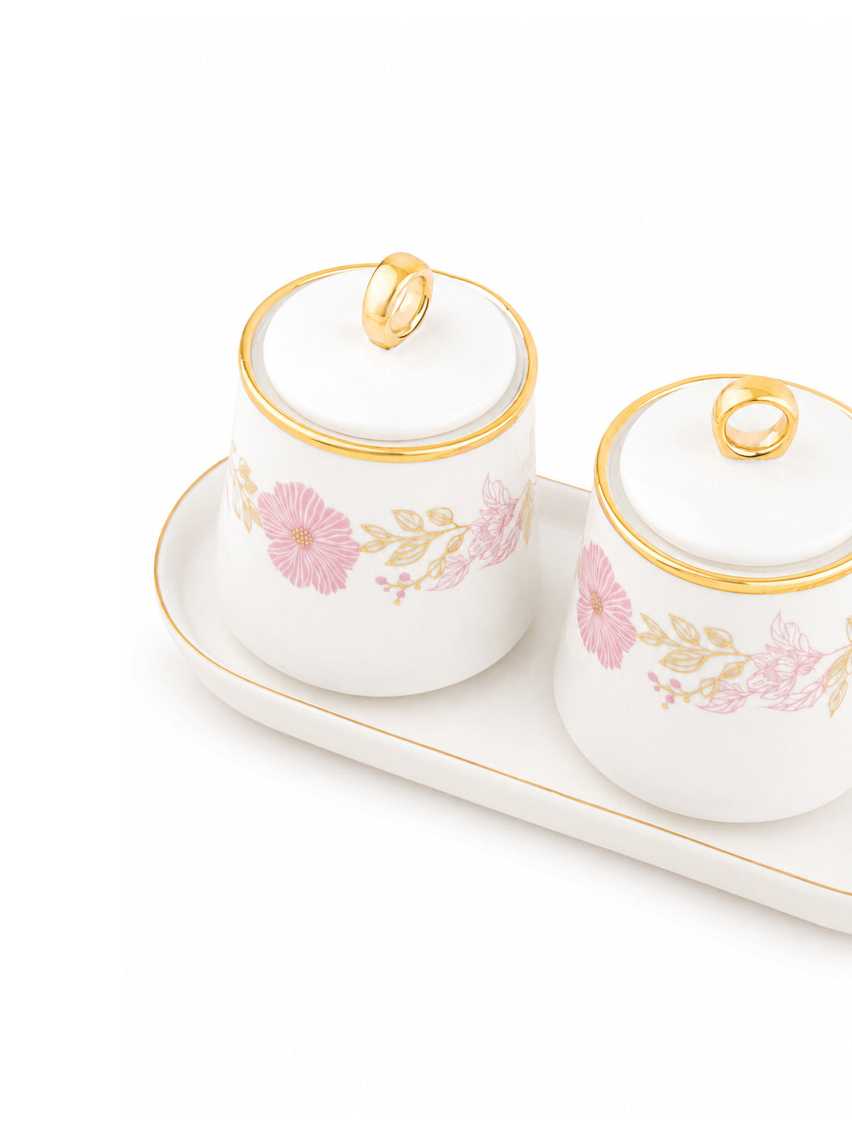 Stylish condiment jars with gold tray

