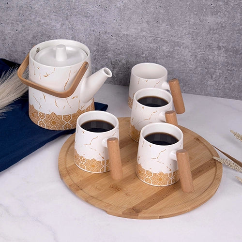 White Tea Set with Bronze Details for Elegant Tea Serving