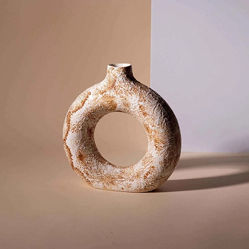Contemporary donut ring vase in a warm brown finish


