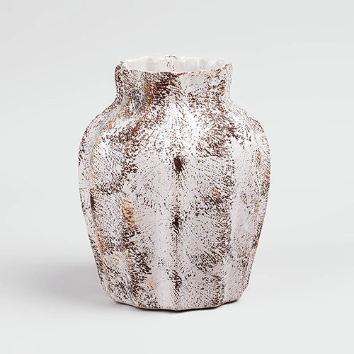 Decorative brown vase featuring a scalloped textured finish

