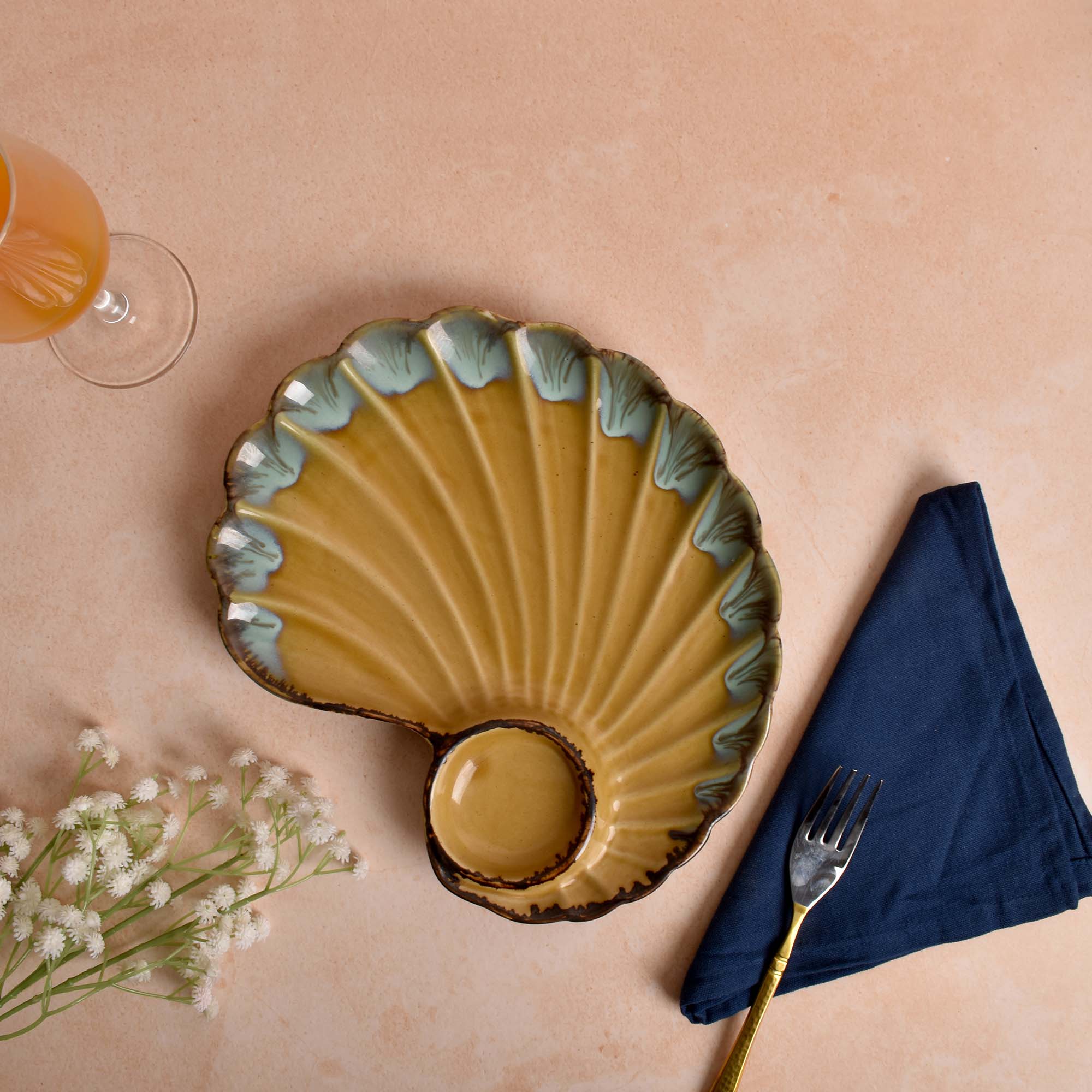 Brownish yellow platter for appetizers and snacks


