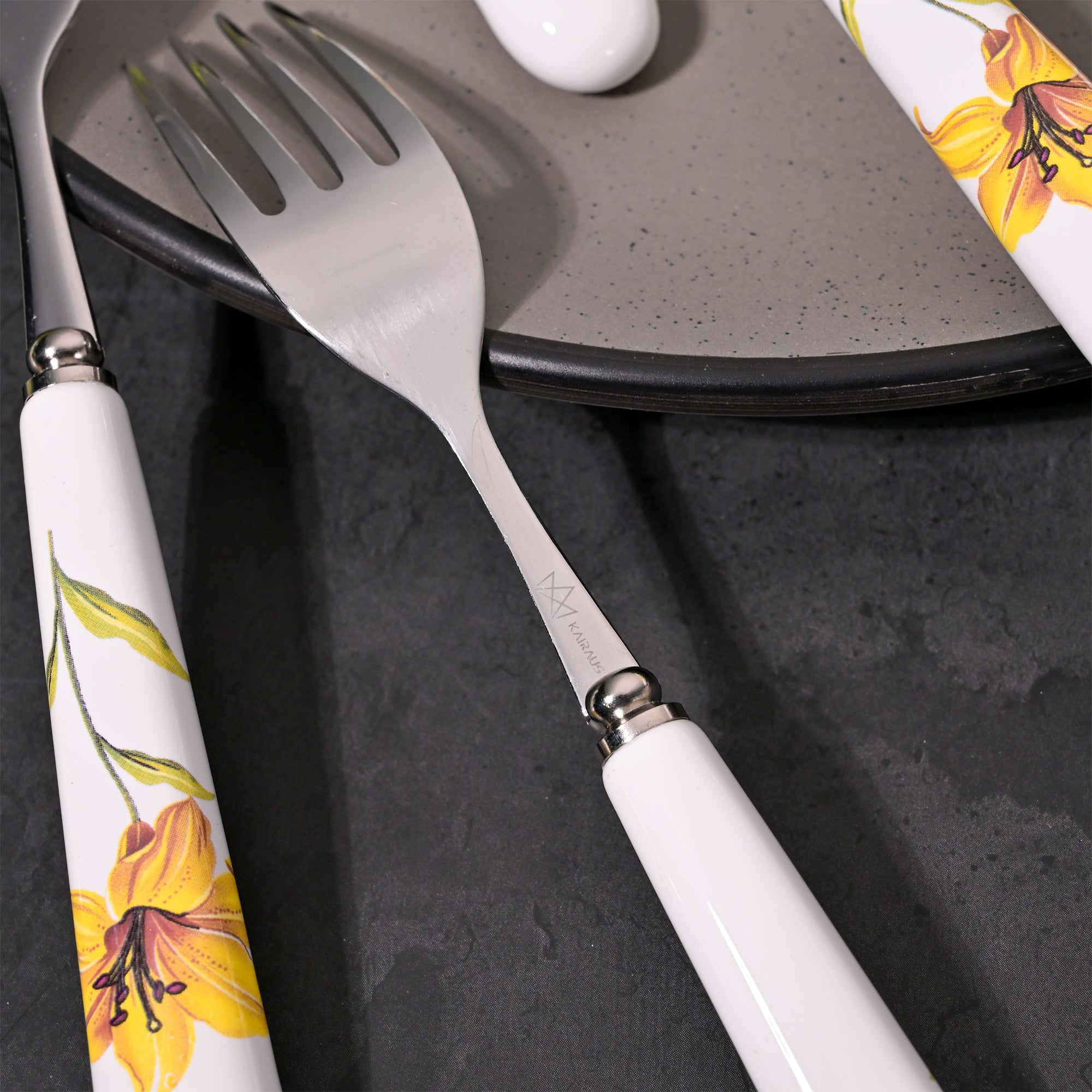 Stylish ceramic and steel dining forks

